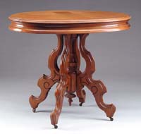 Appraisal: OVAL WALNUT CARVED CENTER TABLE Solid walnut top with carved