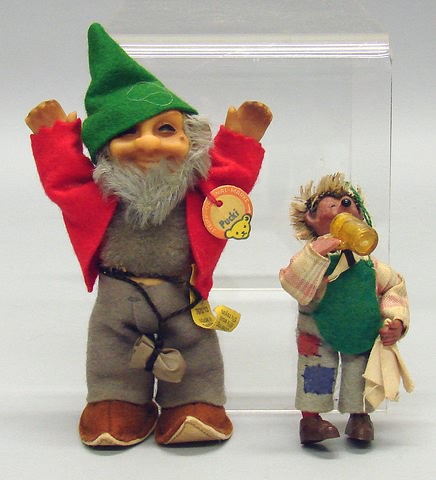 Appraisal: Pair of figures Pucki with PVC head mohair beard and