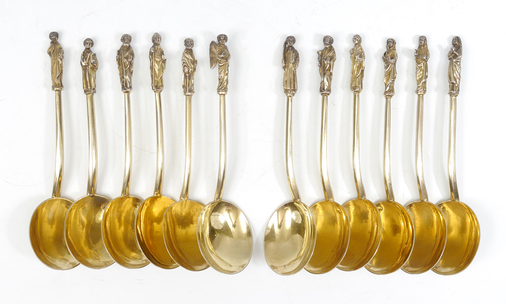 Appraisal: GERMAN SILVER APOSTLE SPOONS vermeil tablespoons each with a different