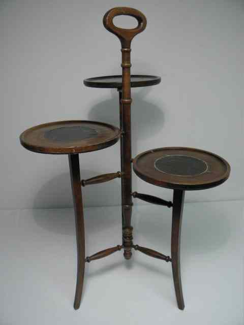 Appraisal: Brandt staggered three tier side table each level with an