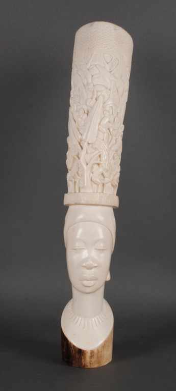 Appraisal: African carved ivory figure of a woman with headdress bust