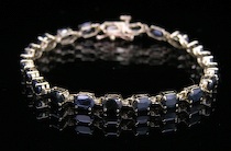 Appraisal: A Yellow Gold And Sapphire Bracelet A yellow gold long