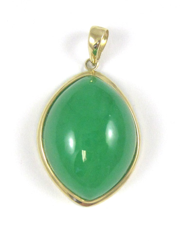 Appraisal: JADE AND FOURTEEN KARAT GOLD PENDANT with a marquise shaped