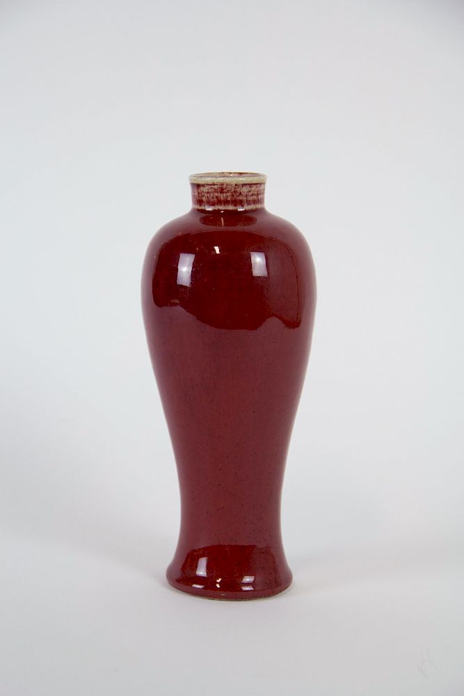 Appraisal: An Oxblood Guanyin Vase Chinese th century Lovely crushed strawberry