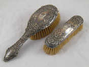 Appraisal: Two Art Nouveau silver backed brushes Birmingham