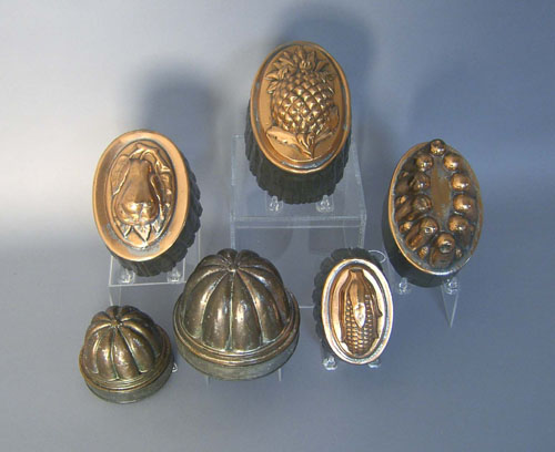 Appraisal: Six tin and copper molds Provenance Collection of Richard and