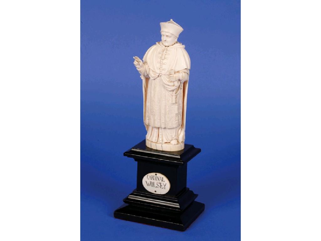 Appraisal: A CARVED IVORY SCULPTURE OF CARDINAL WOLSEY standing with hand