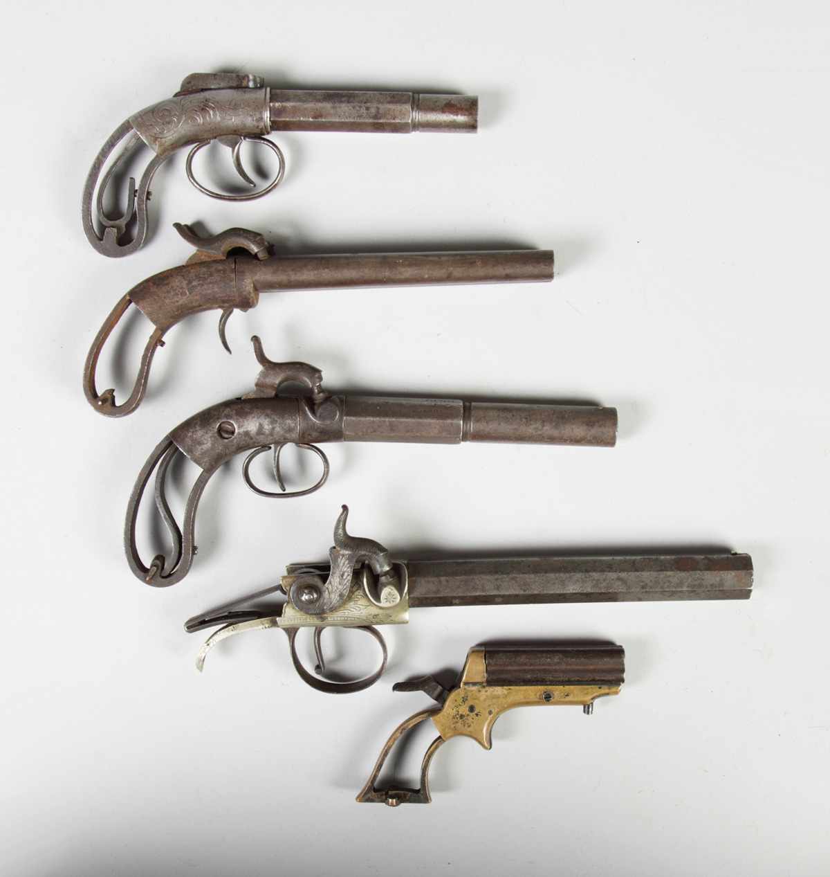 Appraisal: Pistols Top to bottom B S NY single barrel rifled