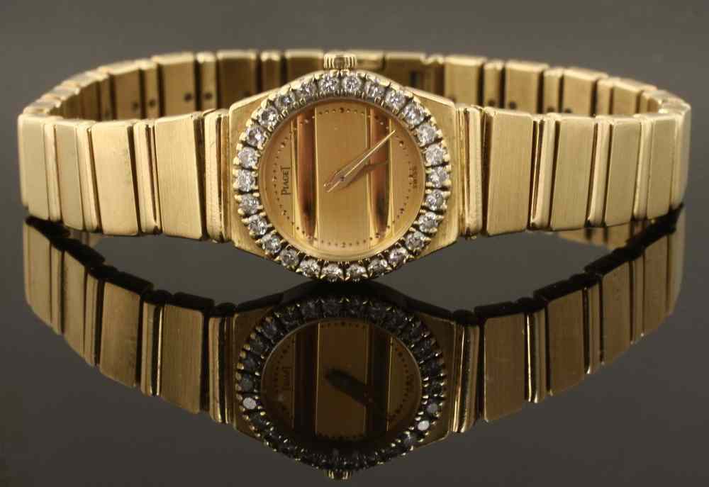 Appraisal: LADY'S WRISTWATCH - One K yellow gold and diamond Piaget