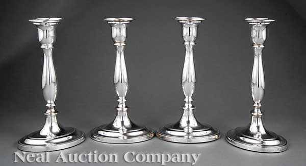 Appraisal: A Fine Set of Four Sheffield Plate Candlesticks th c