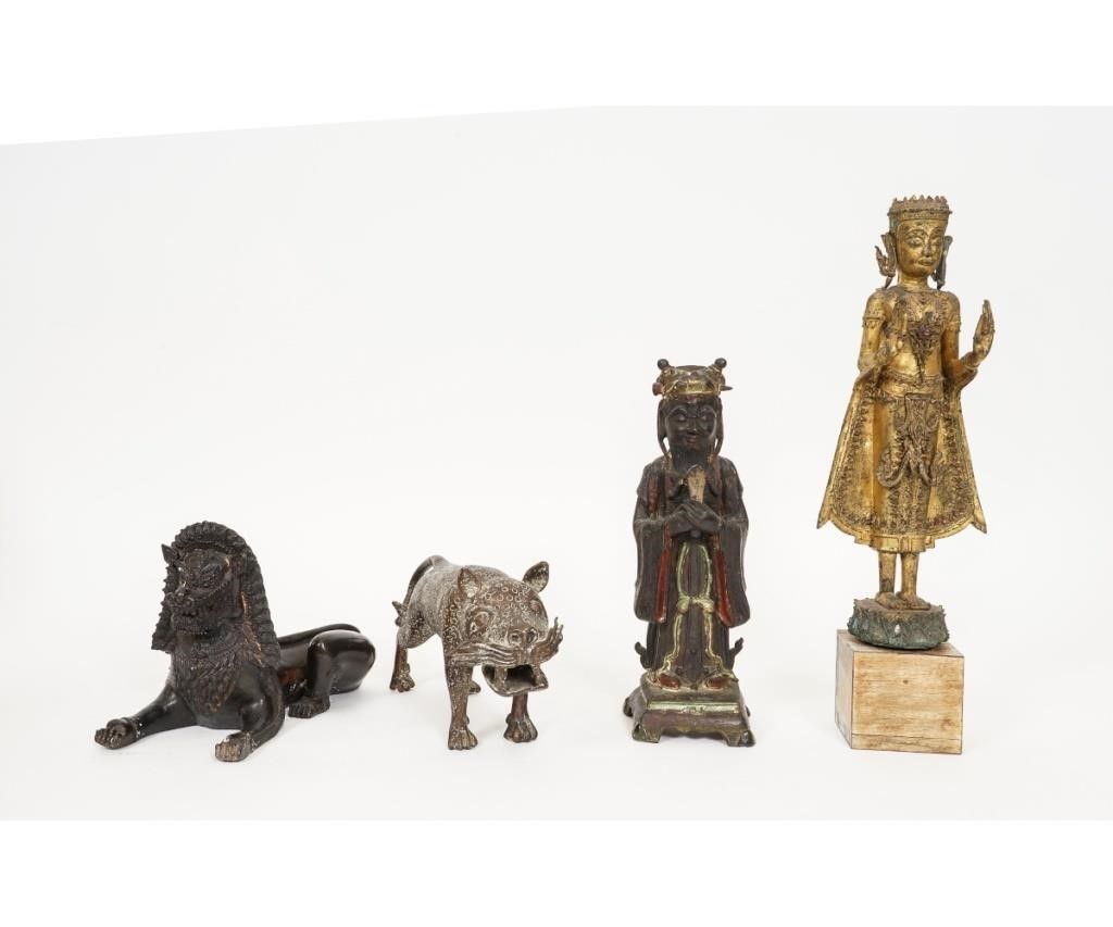 Appraisal: Asian bronze seated Foo dog together with a bronze dog