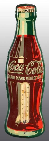 Appraisal: Embossed Tin Coca-Cola Bottle Thermometer Description s A few bends