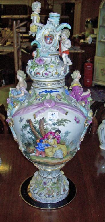 Appraisal: A large Meissen vase and cover decorated with cherubs figures