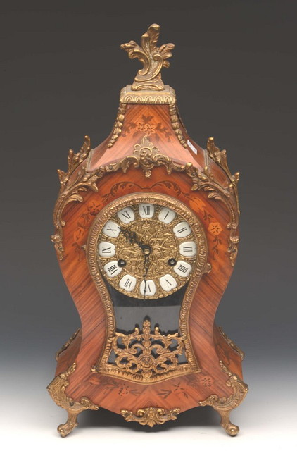 Appraisal: A GERMAN KINGWOOD AND INLAID MANTEL CLOCK with cast brass