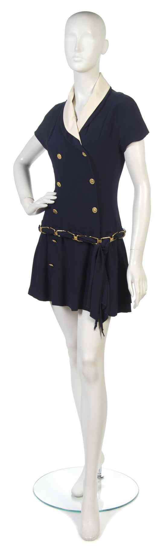 Appraisal: A Chanel Blue Silk Dress with gold clover buttons and