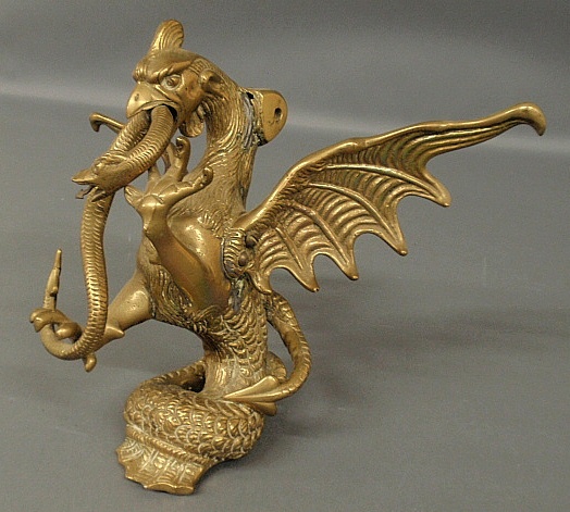 Appraisal: - Large brass doorknocker of a dragon with serpent As