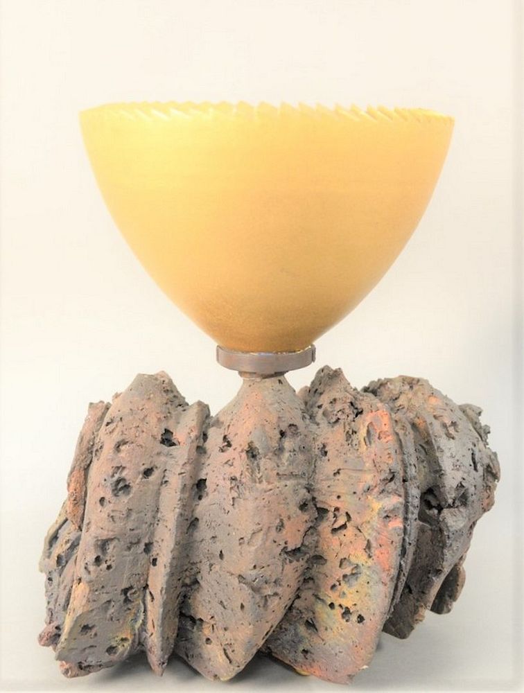 Appraisal: Adrian Saxe b gold bowl on Raku fired ceramic natural