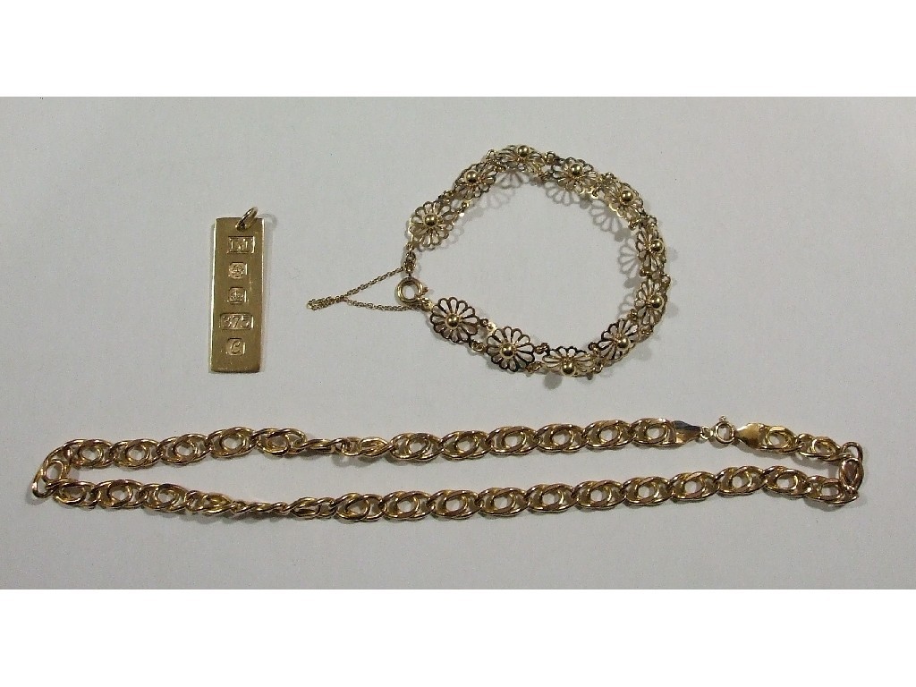 Appraisal: Nine carat gold bracelet neckchain and ingot Approximately gms