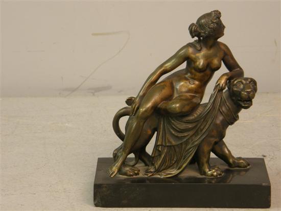 Appraisal: A th century bronze Nude seated on a leopard on