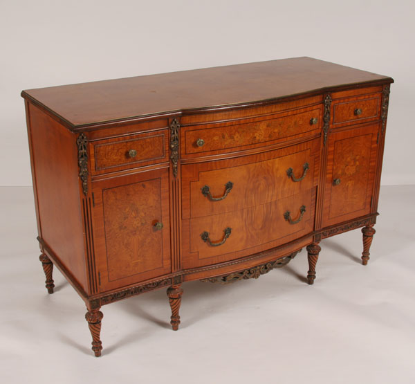 Appraisal: Server sideboard five drawer two door six shaped legs bookmatch