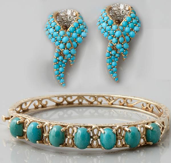 Appraisal: A pair of turquoise diamond and k gold ear-clip with