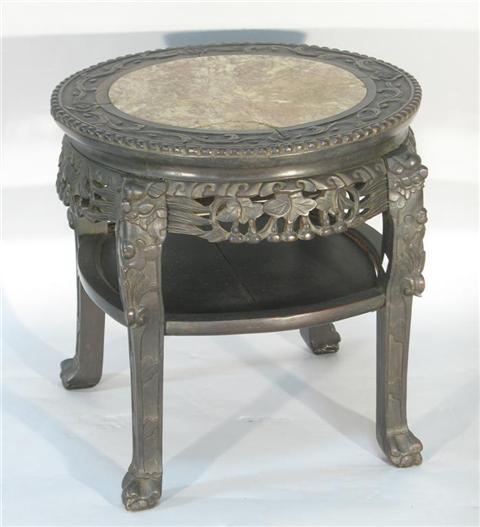 Appraisal: CHINESE HEAVILY CARVED MARBLE TOP LOW TABLE Late th century