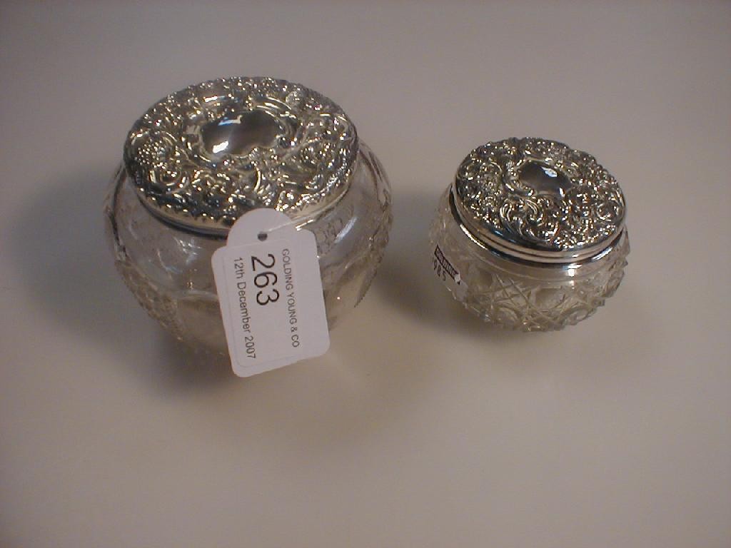 Appraisal: An Edwardian silver topped dressing table jar Birmingham and another