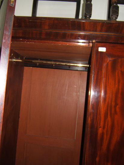 Appraisal: A Victorian mahogany two door wardrobe on a plinth base