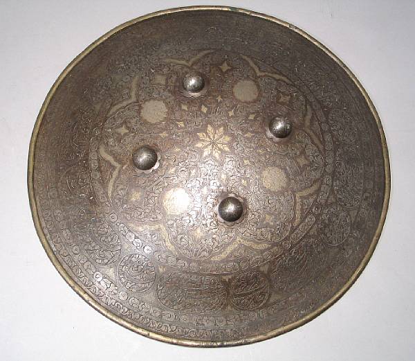 Appraisal: An Indo-Persian shield th century The circular domed steel shield