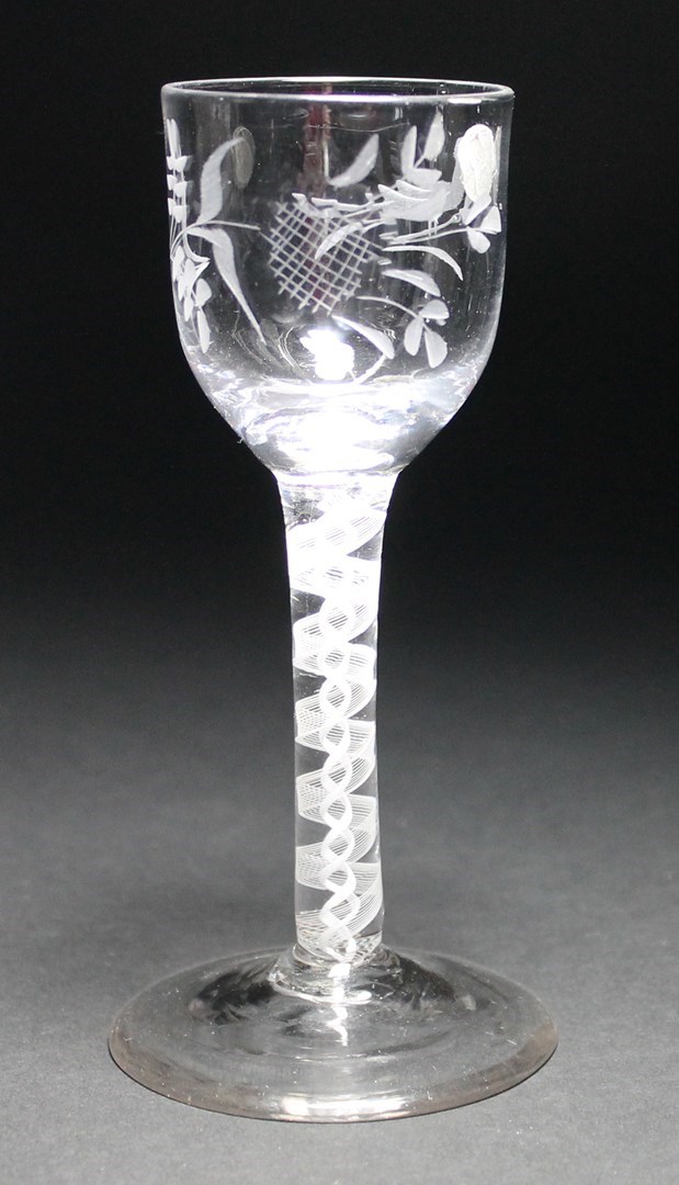 Appraisal: An opaque twist wine glass circa the ogee bowl engraved