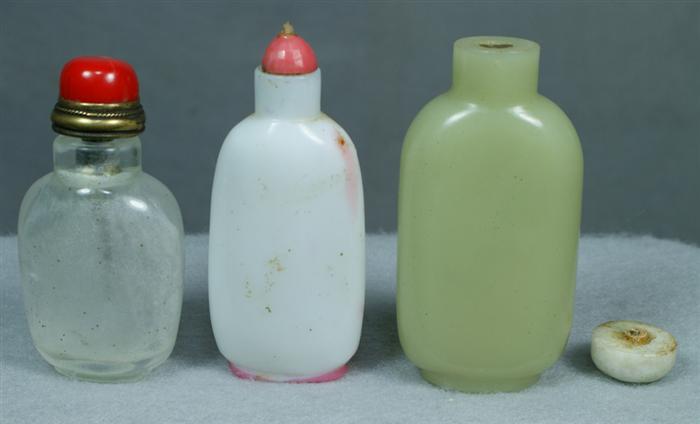 Appraisal: Three assorted plain Peking glass snuff bottles one stopper is