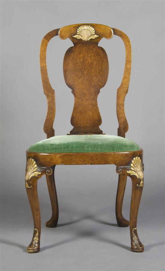 Appraisal: A George II Style Walnut and Parcel Gilt Armchair Height