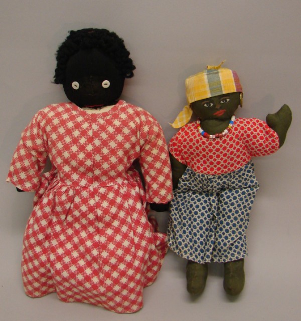 Appraisal: Pair of black cloth dolls Both are handmade Has a