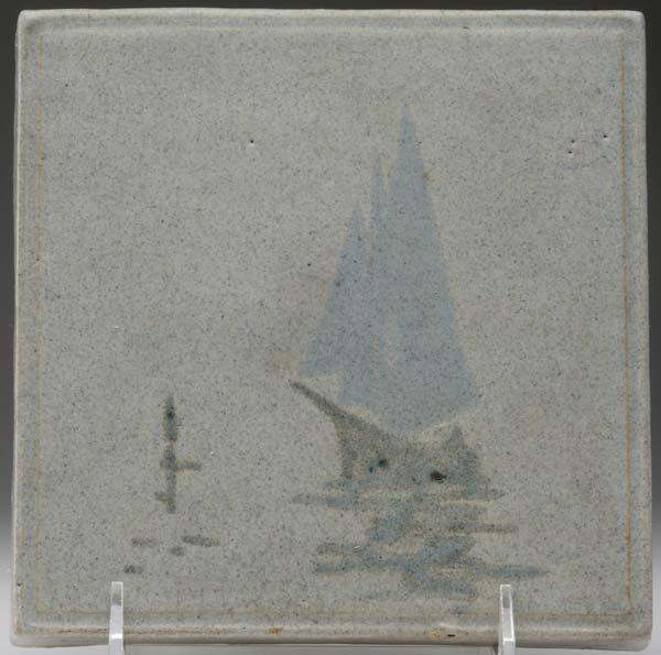 Appraisal: MARBLEHEAD Tile with a sailboat on calm waters in three