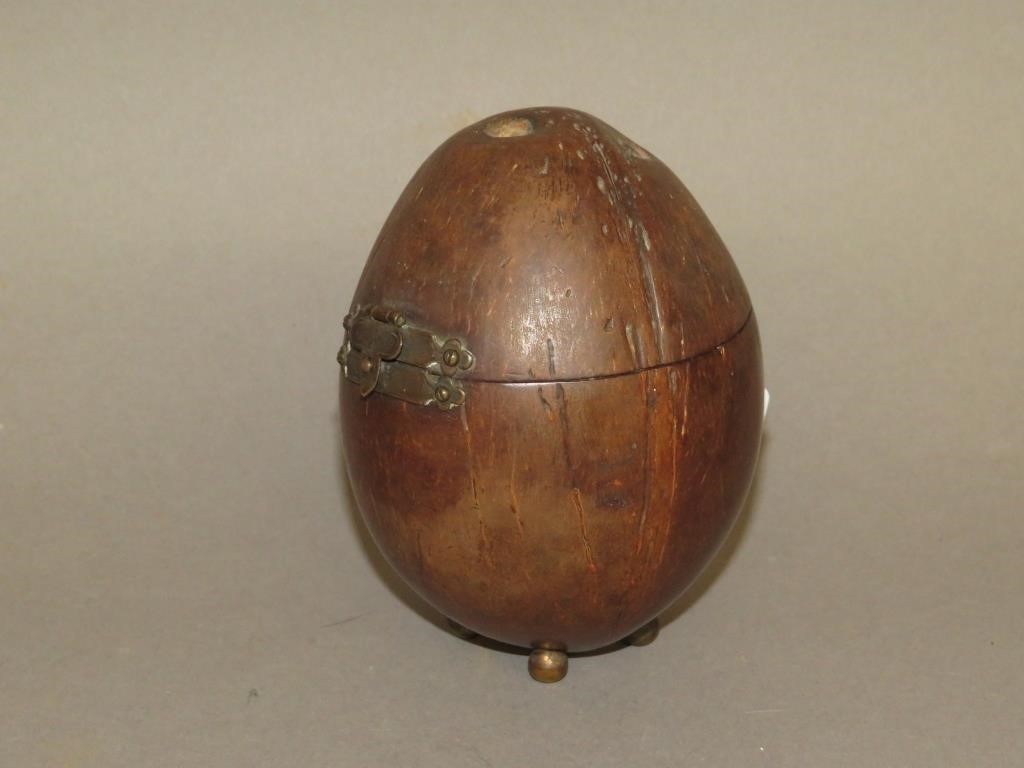 Appraisal: TURNED COCONUT SHELL TEA CADDYca late th century uncommon turned