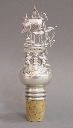 Appraisal: A continental silver bottle stopper in the form of a