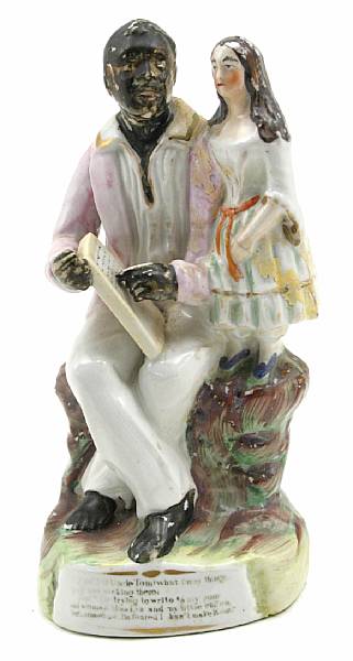 Appraisal: A porcelain figural group of Uncle Tom and Miss Eva