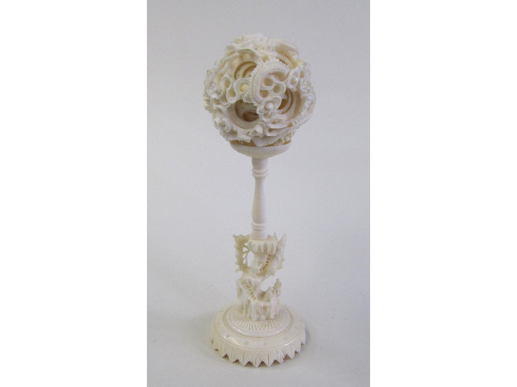 Appraisal: Carved ivory puzzle ball on stand