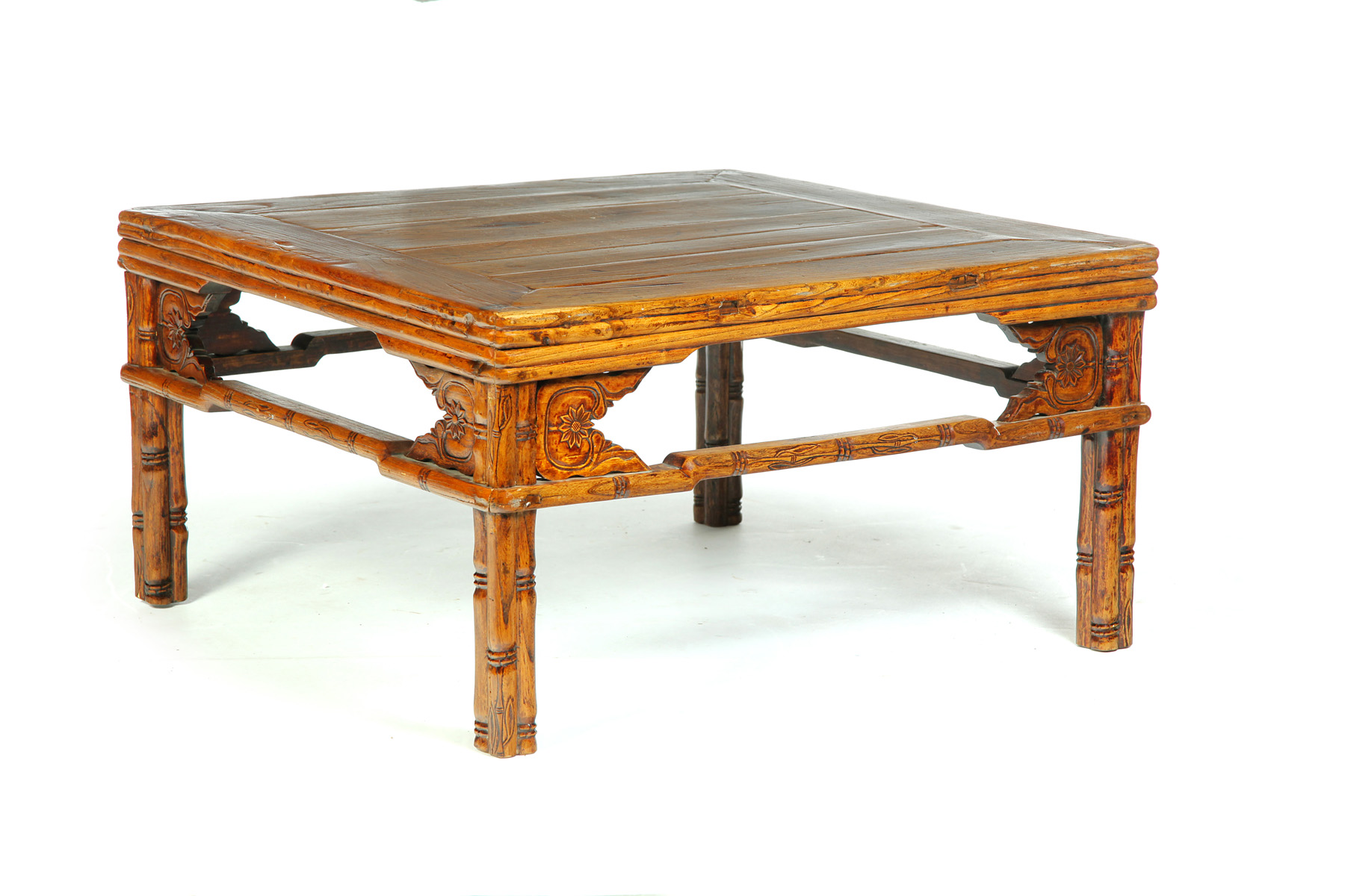 Appraisal: CHINESE LOW TABLE Twentieth century elm Mortised construction Carved in