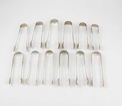 Appraisal: Eleven various pairs of antiques provincial sugar tongs Sheffield Chester