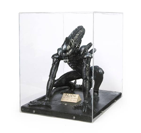 Appraisal: A small sculpture of an alien from Alien Rendered in