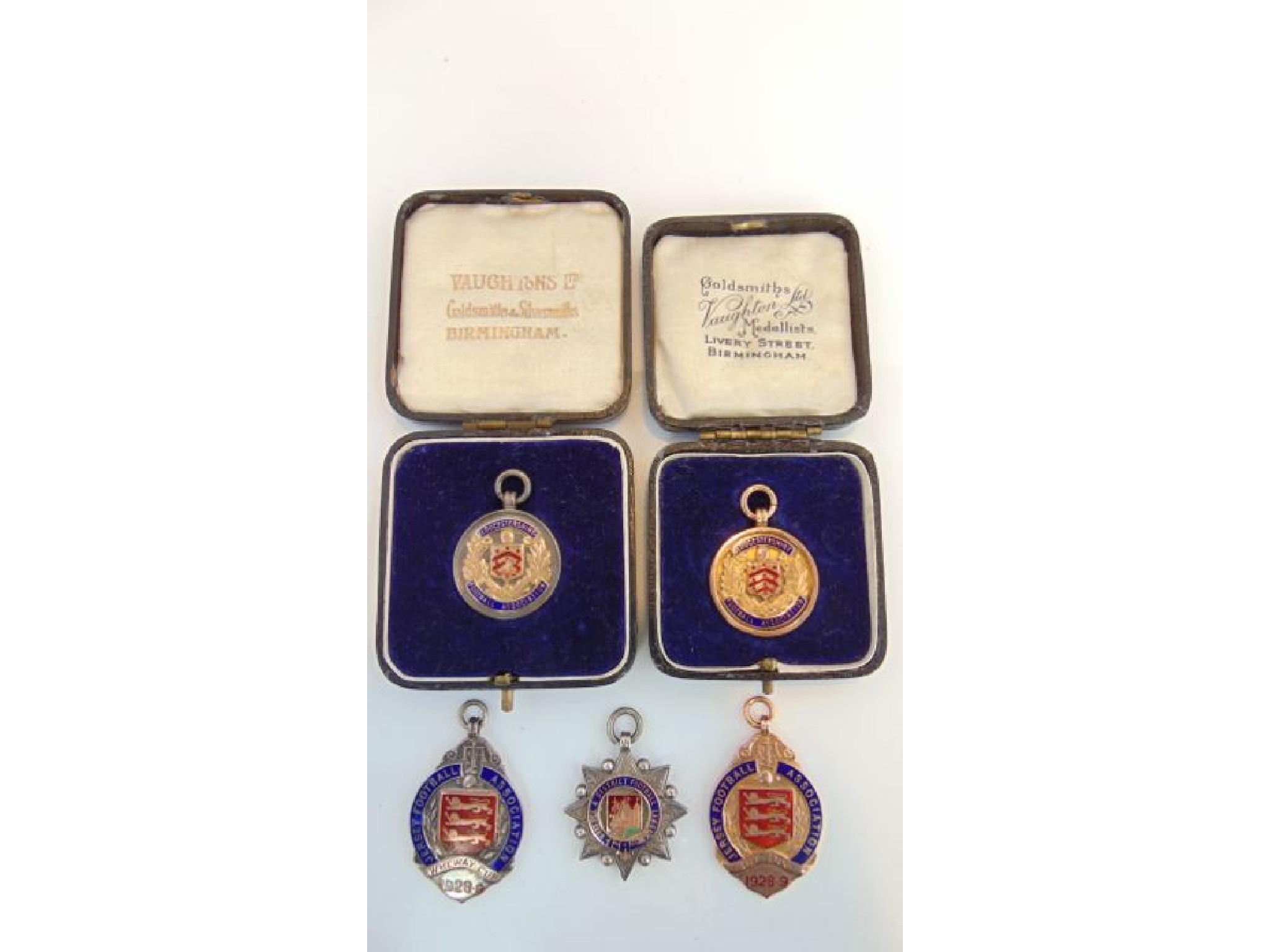 Appraisal: A ct gold and enamelled medallion Jersey Football association -