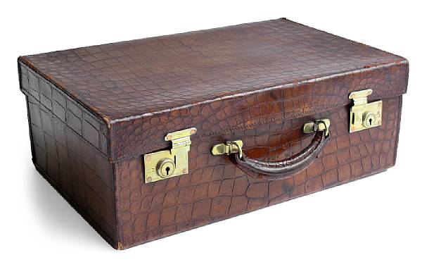 Appraisal: A Greaves crocodile suitcase London The rectangular case with covered