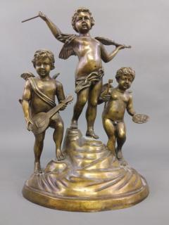 Appraisal: Cherub bronze Bronze of three cherub musicians late th century