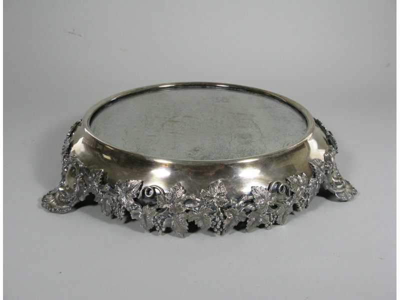 Appraisal: Silverplate Mirrored Plateau th c footed circular form silverplate with