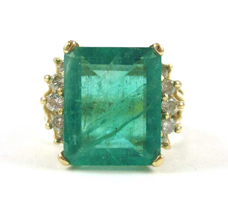 Appraisal: EMERALD DIAMOND AND FOURTEEN KARAT GOLD RING with five round-cut