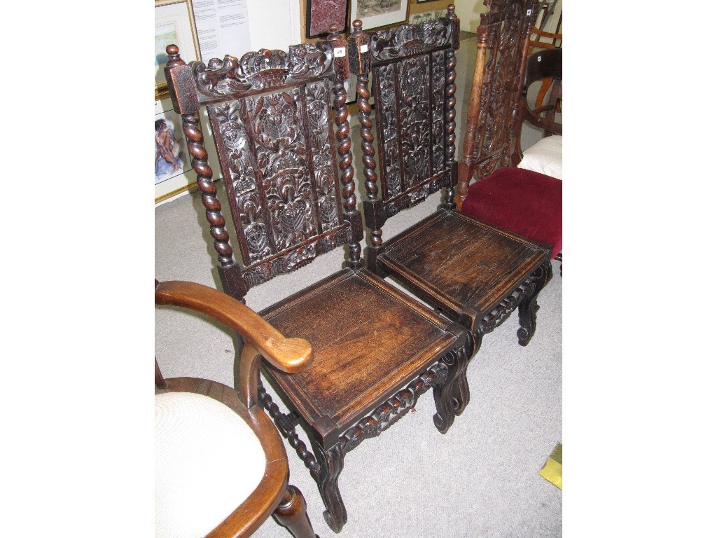 Appraisal: Pair of carved oak barley twist hall chairs