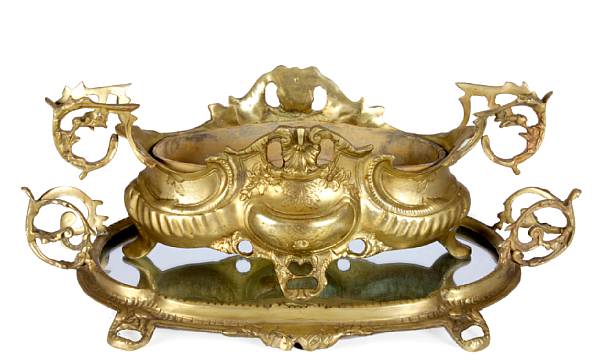 Appraisal: A pair of Louis XV style brass oval jardineres on