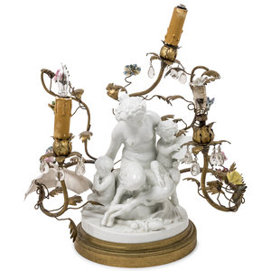 Appraisal: A Gilt Metal Mounted White Glazed Porcelain Figural Group after