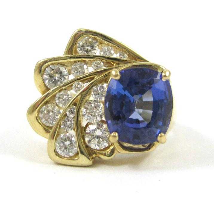 Appraisal: TANZANITE DIAMOND AND FOURTEEN KARAT GOLD RING with graduated round-cut